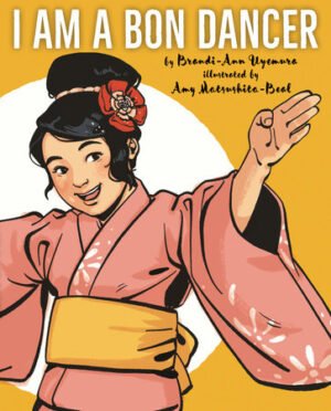 A little girl is dressed in a kimono and a flower in her hair. Her arms are outstretched in a dance and there is a sun in the background. The book title, author's and illustrator's names are in all-caps.