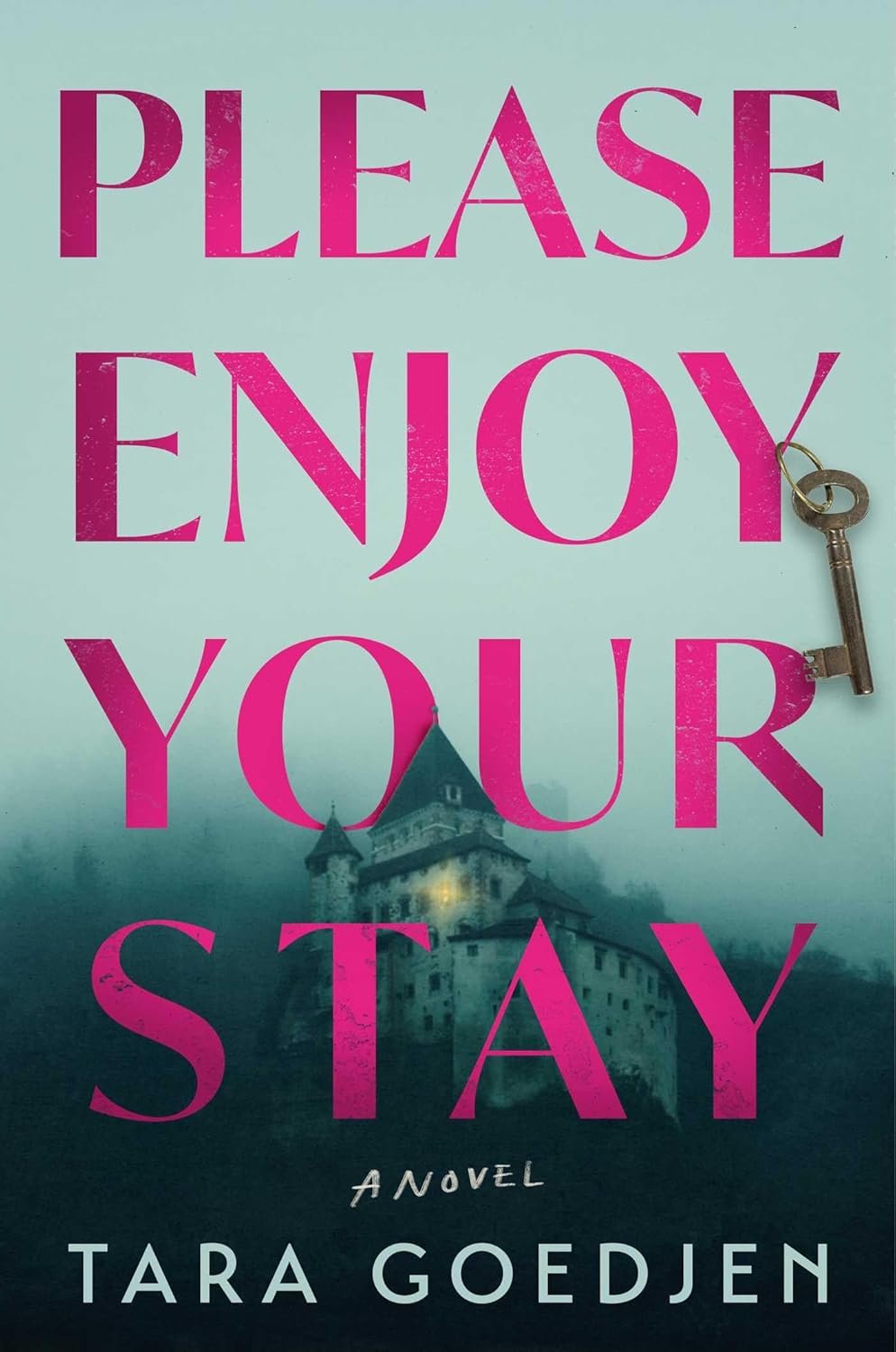 Cover for Please Enjoy Your Stay, a gothic mystery by Tara Goedjen, coming out in October 2026, showing a European castle-turned-hotel, shrouded in fog, with a single light on. A room key hangs from the bold, dark pink title font.