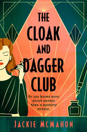 Cover for The Cloak and Dagger Club, showing a 1930s woman holding a bleeding pen over an Art Deco background. She has red hair and a green dress. The book title and the author's name, Jackie McMahon, are written in a vintage font. The tagline is: No one knows more about murder than a mystery writer.