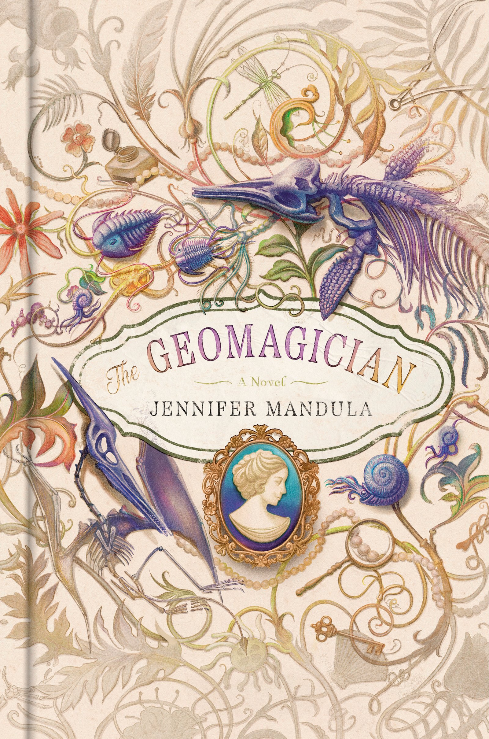 Cover for The Geomagician, with the title in the center and illustrations of fossils and florals in pinks, purples, and green. The largest items are a pterodactyl skeleton and an ichthosaur skeleton. The background is a parchment-color, and the illustrations are vintage in style.