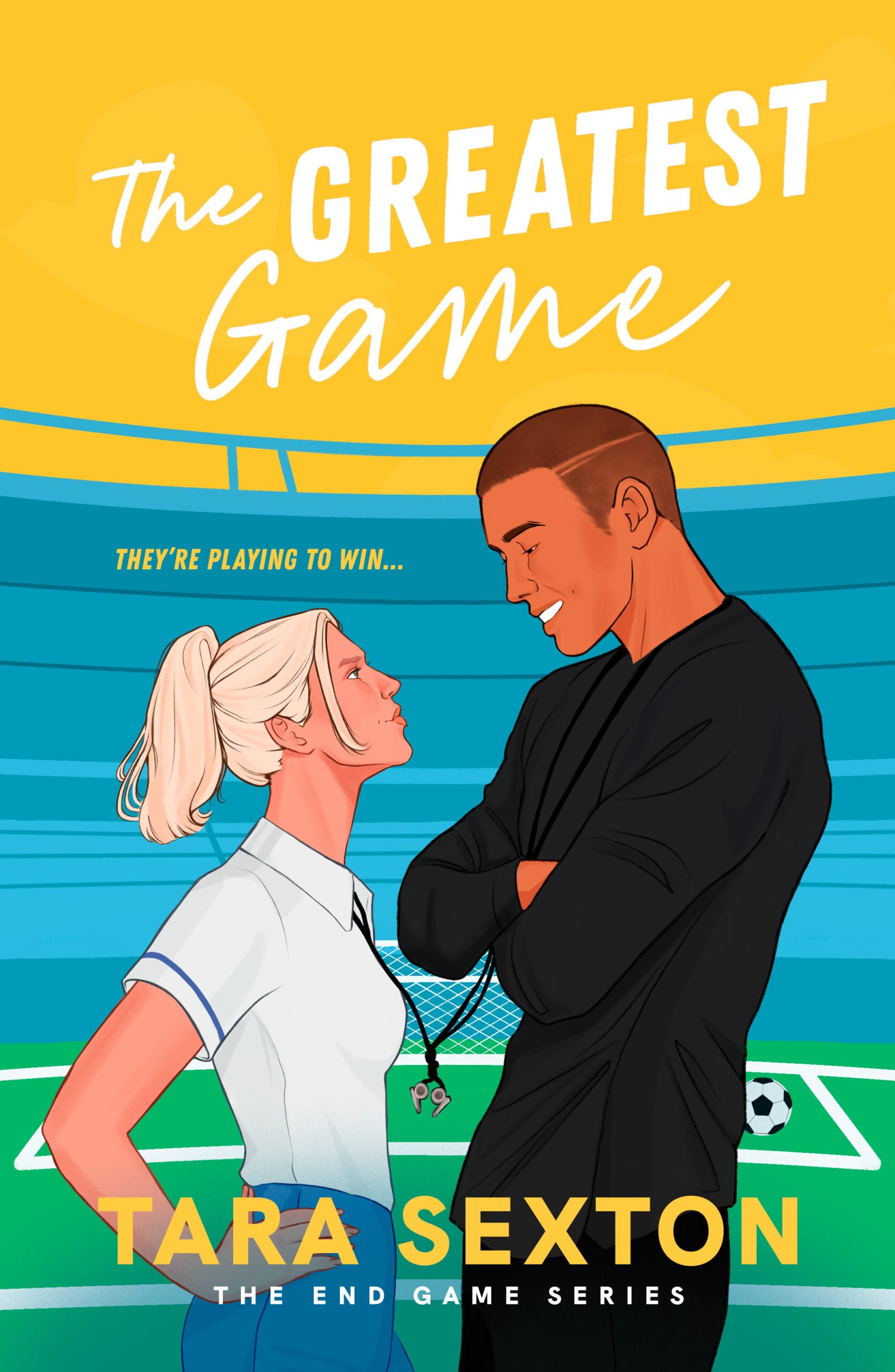 Cover for The Greatest Game. A woman with blonde hair stands in front of an African American man as they stare defiantly at each other. They wear sports clothes and their whistles are tangled together. In the background is a soccer field with a goal and soccer ball.