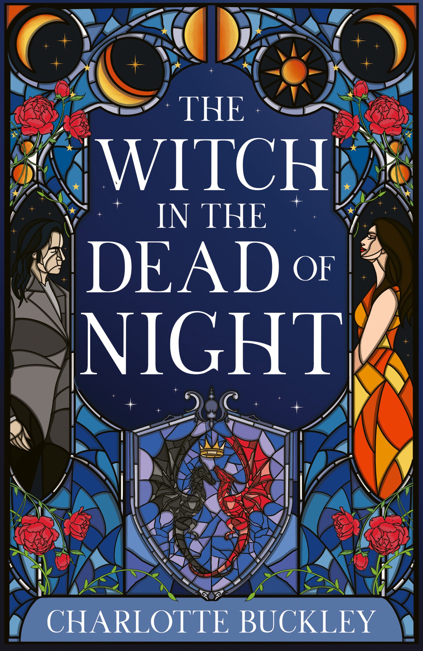 Cover of The Witch in the Dead of Night, showing a stained glass-style illustration on a navy background with red roses around the border. Two figures, a man dressed in black and a woman in orange, are depicted on the far left and far right of the cover, respectively, watching each other. The book title is written in the middle of the cover, and the author's name, Charlotte Buckley, is written at the bottom. Yellow moons and suns are depicted across the top border, and a pair of black and red wyverns intertwined at the tail at the bottom above the author's name.